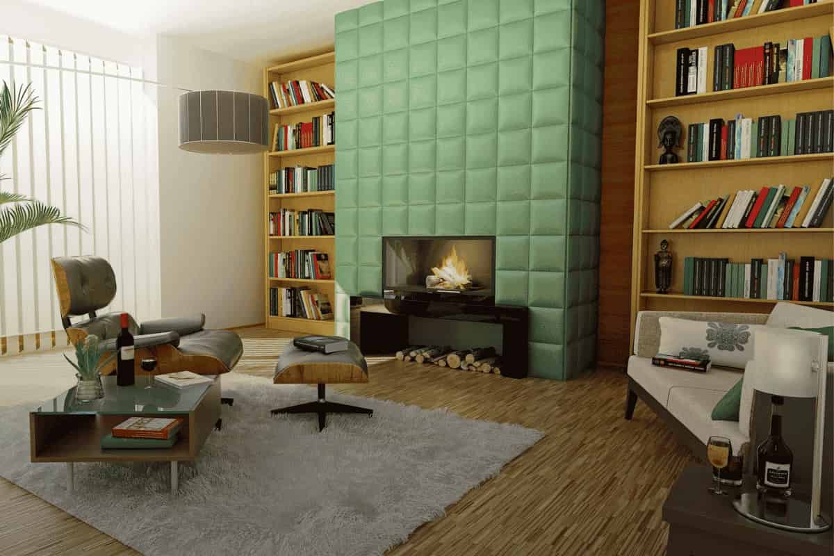 Modern luxury living room with a fireplace, bookshelves, comfortable seating and contemporary interior design